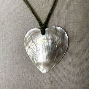 abalone heart pendant necklace on green cord